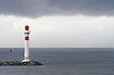 Lighthouse Of Cannes Under A Cloudy Sky